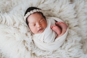 newborn photography with props